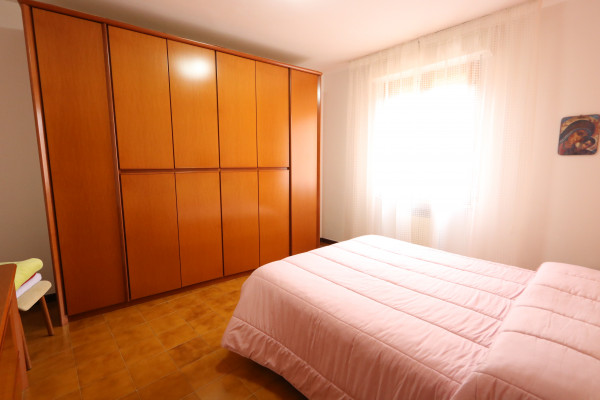 Ingrandisci la foto