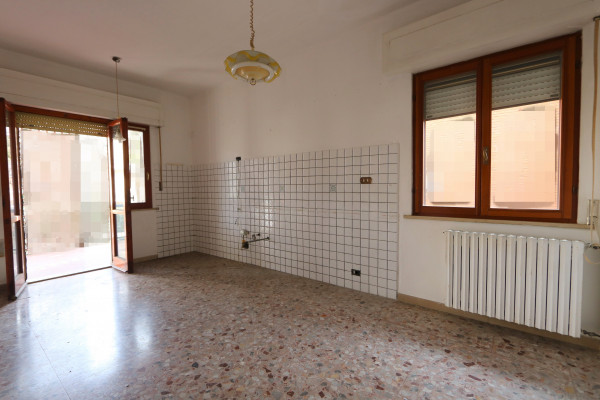 Ingrandisci la foto