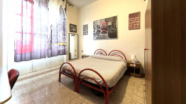 Ingrandisci la foto