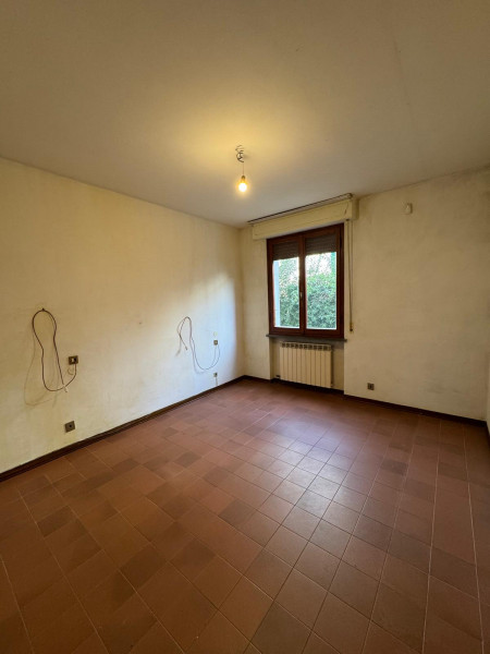 Ingrandisci la foto