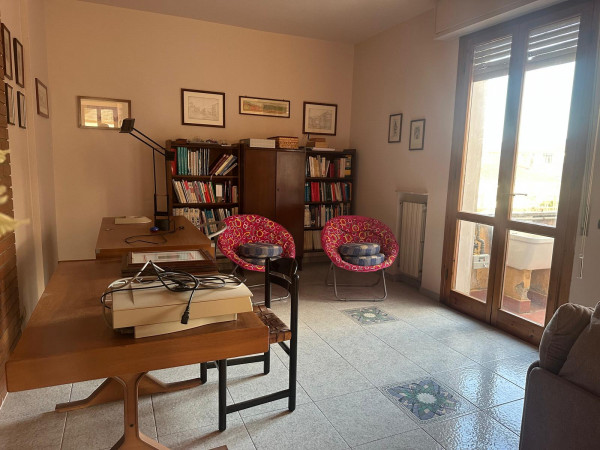 Ingrandisci la foto
