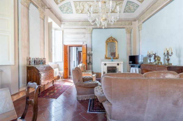 Ingrandisci la foto