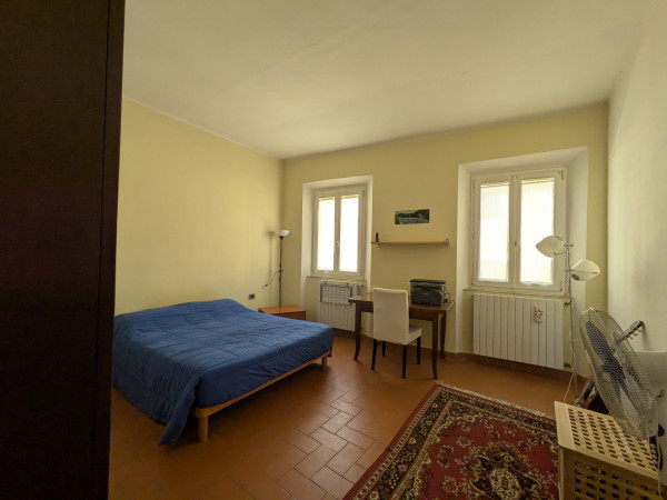 Ingrandisci la foto