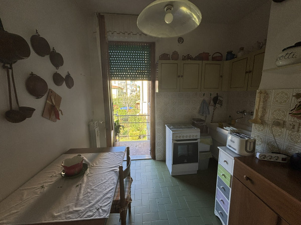 Ingrandisci la foto