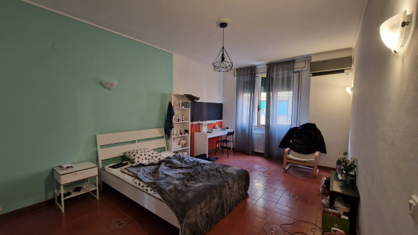 Ingrandisci la foto