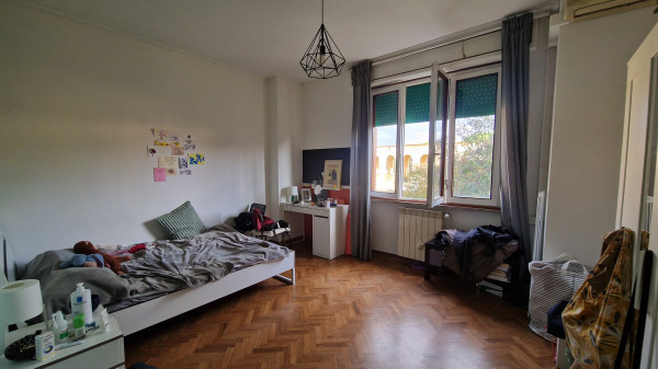 Ingrandisci la foto