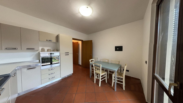 Ingrandisci la foto