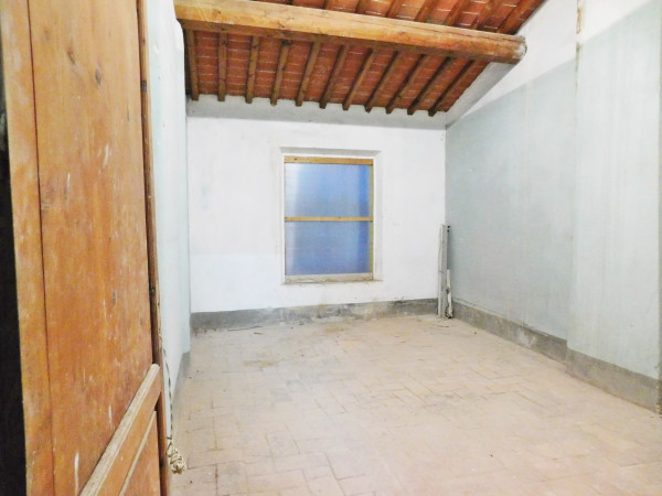 Ingrandisci la foto