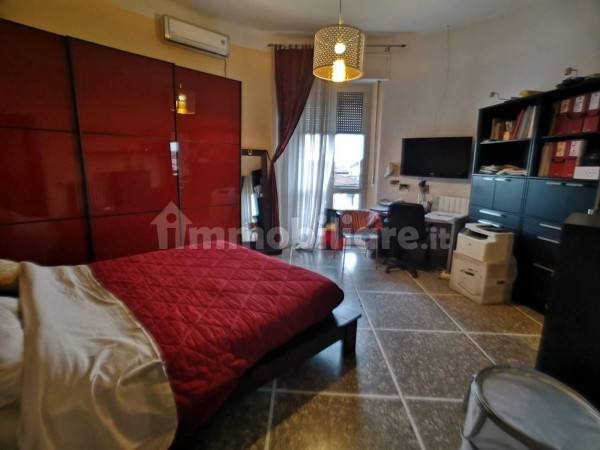 Ingrandisci la foto