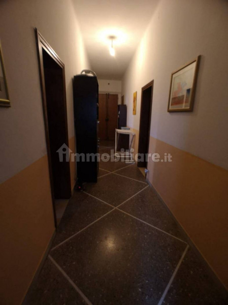 Ingrandisci la foto