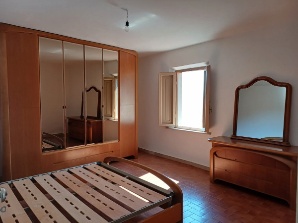 Ingrandisci la foto