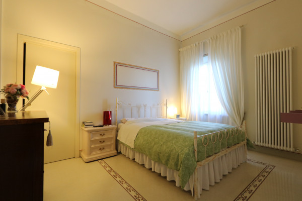 Ingrandisci la foto