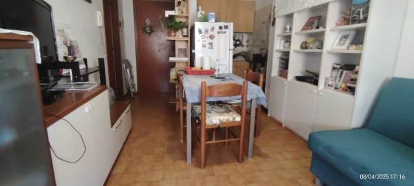Ingrandisci la foto