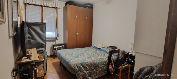 Ingrandisci la foto