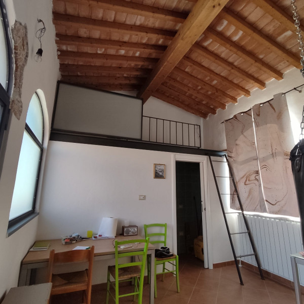 Ingrandisci la foto
