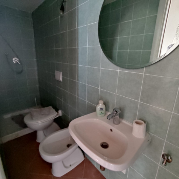 Ingrandisci la foto