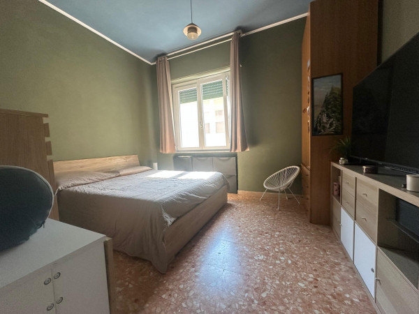 Ingrandisci la foto
