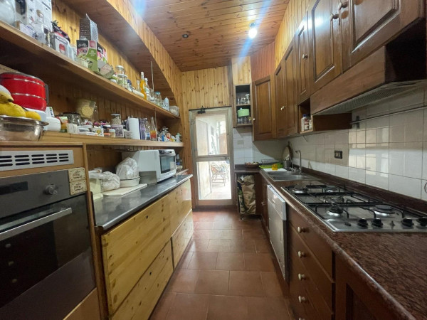 Ingrandisci la foto