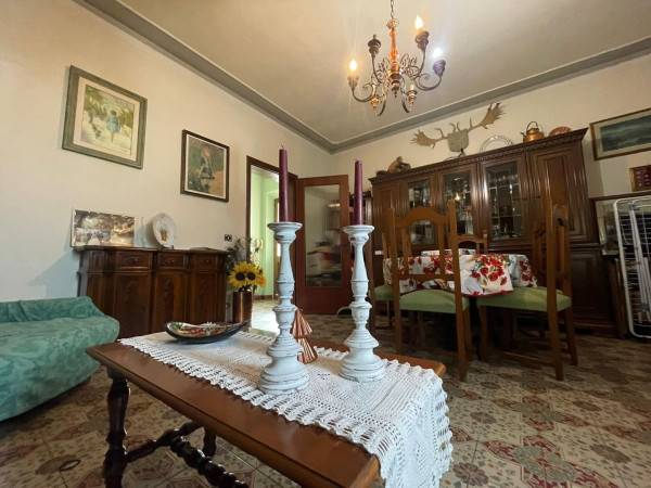 Ingrandisci la foto