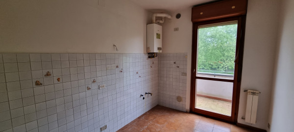 Ingrandisci la foto
