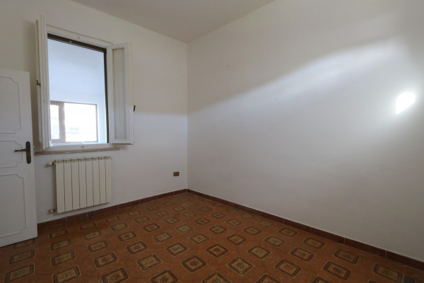 Ingrandisci la foto