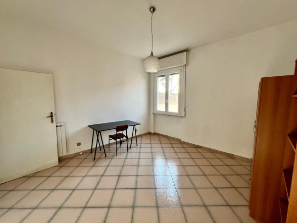 Ingrandisci la foto