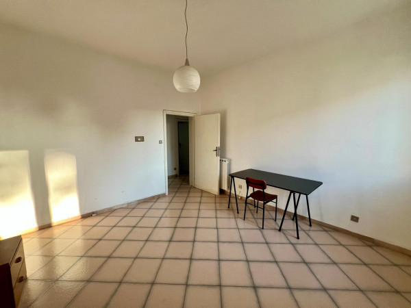 Ingrandisci la foto