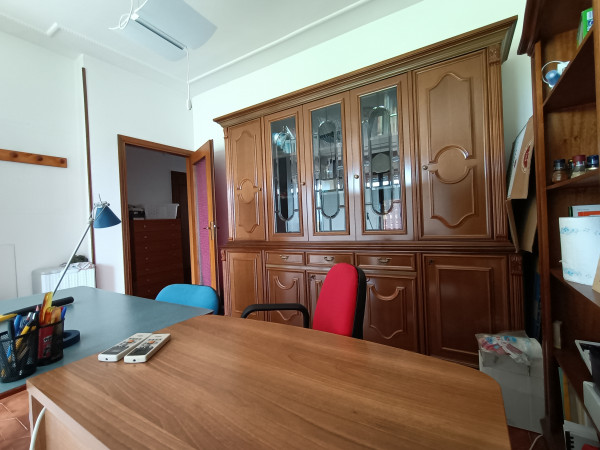 Ingrandisci la foto