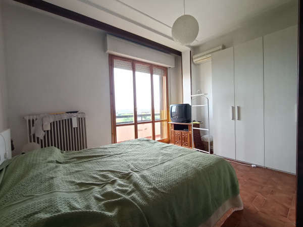 Ingrandisci la foto
