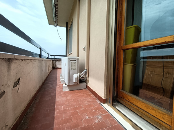 Ingrandisci la foto