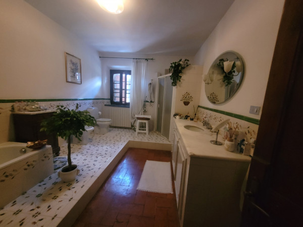 Ingrandisci la foto