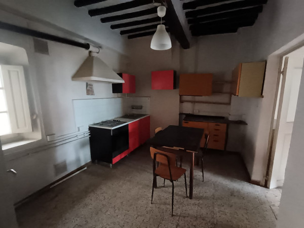 Ingrandisci la foto