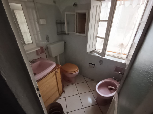 Ingrandisci la foto