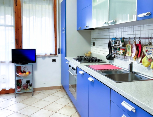 Ingrandisci la foto