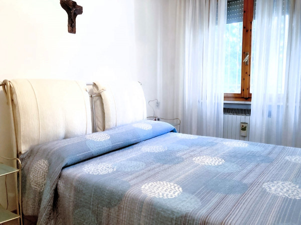 Ingrandisci la foto
