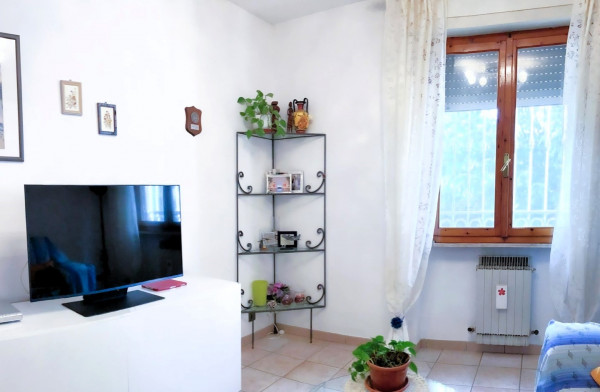 Ingrandisci la foto