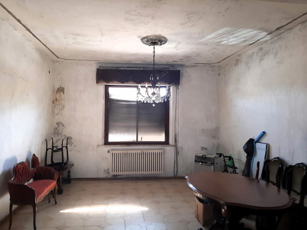 Ingrandisci la foto