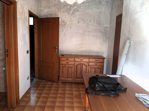 Ingrandisci la foto