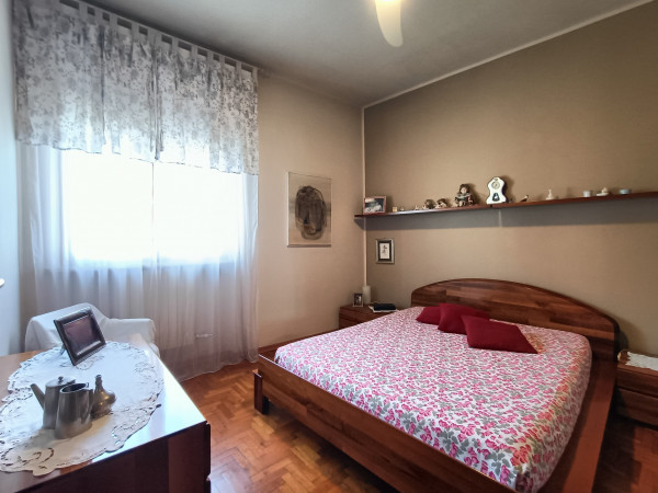 Ingrandisci la foto
