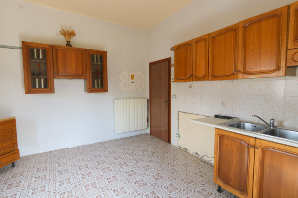Ingrandisci la foto