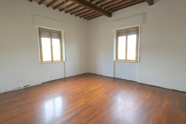 Ingrandisci la foto