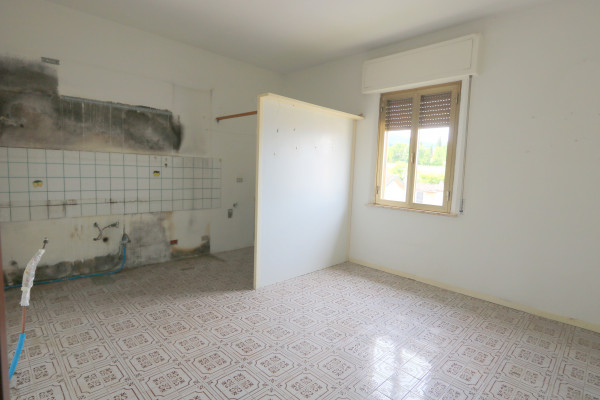 Ingrandisci la foto
