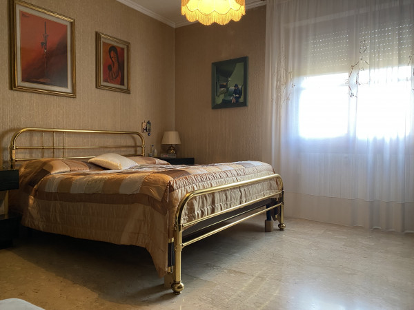 Ingrandisci la foto