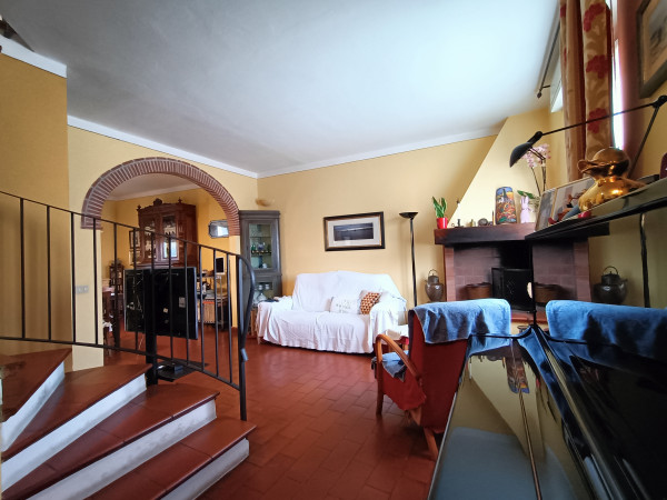 Ingrandisci la foto