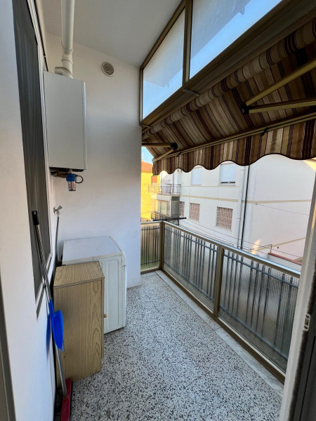 Ingrandisci la foto