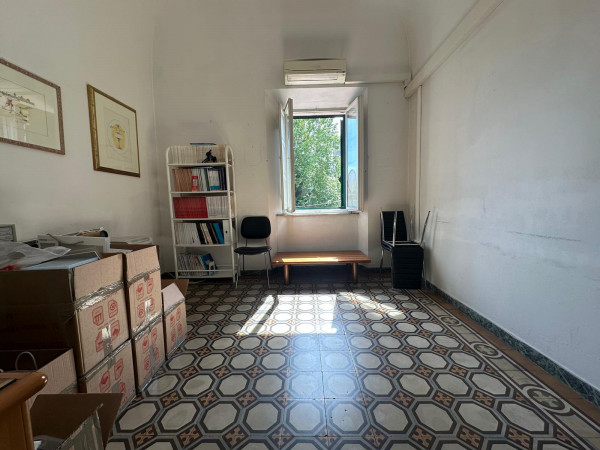 Ingrandisci la foto
