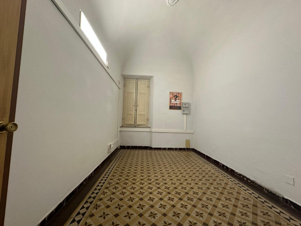 Ingrandisci la foto