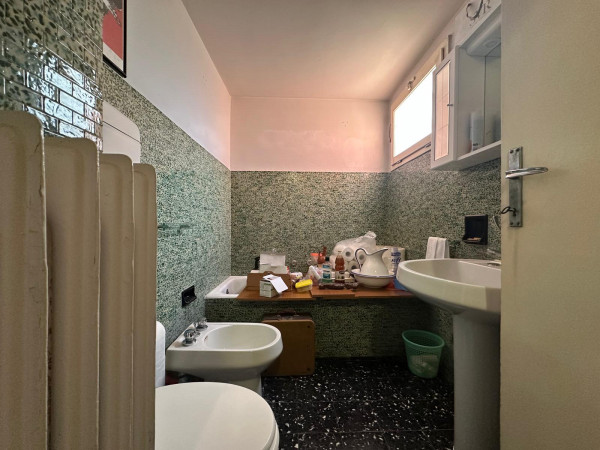 Ingrandisci la foto