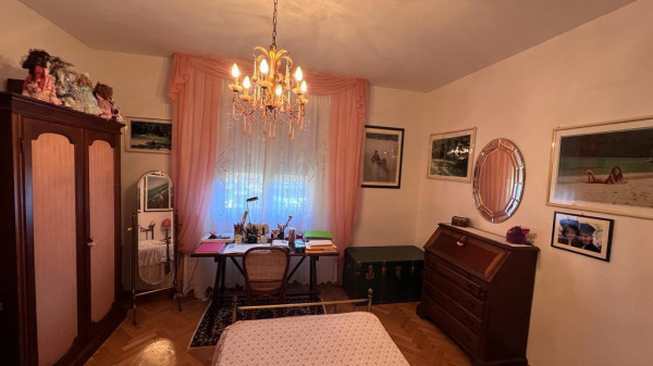 Ingrandisci la foto