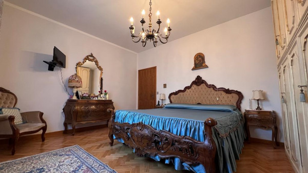 Ingrandisci la foto